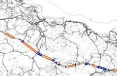 Reducing High-Speed Rail Costs by Combined Double-Single Tracks